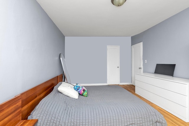 84-19 51st Ave Unit 2E, Elmhurst, NY 11373 - bedroom with wood finished floors and baseboards