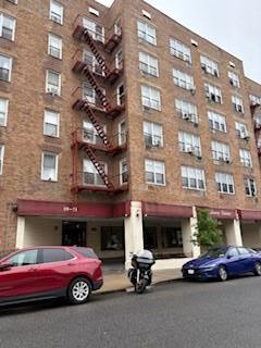 59-21 Calloway Unit 4G, Corona, NY 11368 - view of apartment building / complex