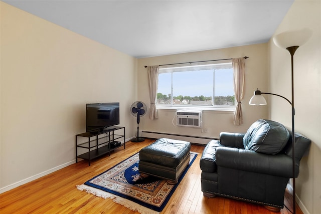 395 Westchester Ave Unit 3A, Port Chester, NY 10573 - living area with baseboard heating, wood finished floors, and a wall mounted air conditioner