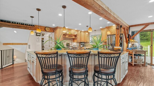 42 Blackstone Rdg, Holmes, NY 12531 - kitchen featuring freestanding refrigerator, light wood-style flooring, recessed lighting, a large island with sink, and light stone counters