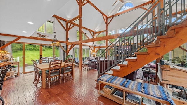 42 Blackstone Rdg, Holmes, NY 12531 - dining room with high vaulted ceiling, hardwood / wood-style flooring, stairway, and recessed lighting