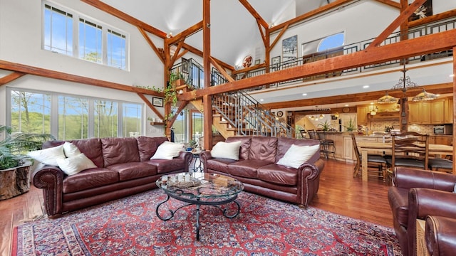 42 Blackstone Rdg, Holmes, NY 12531 - living area with a high ceiling, wood finished floors, stairs, and recessed lighting