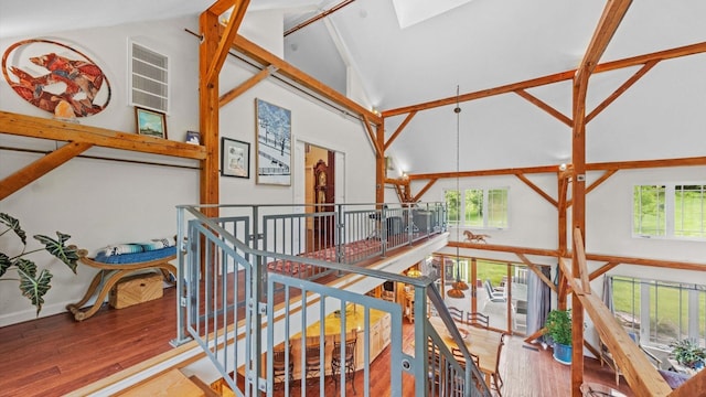 42 Blackstone Rdg, Holmes, NY 12531 - stairway featuring high vaulted ceiling, wood finished floors, and a skylight