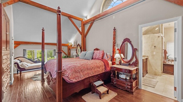 42 Blackstone Rdg, Holmes, NY 12531 - bedroom with vaulted ceiling, hardwood / wood-style flooring, and ensuite bath