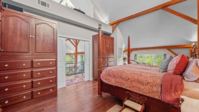 42 Blackstone Rdg, Holmes, NY 12531 - bedroom featuring wood finished floors and vaulted ceiling