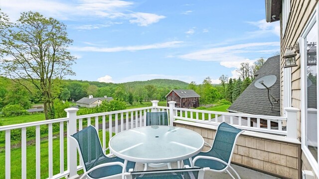 42 Blackstone Rdg, Holmes, NY 12531 - view of wooden balcony featuring outdoor dining space and a deck