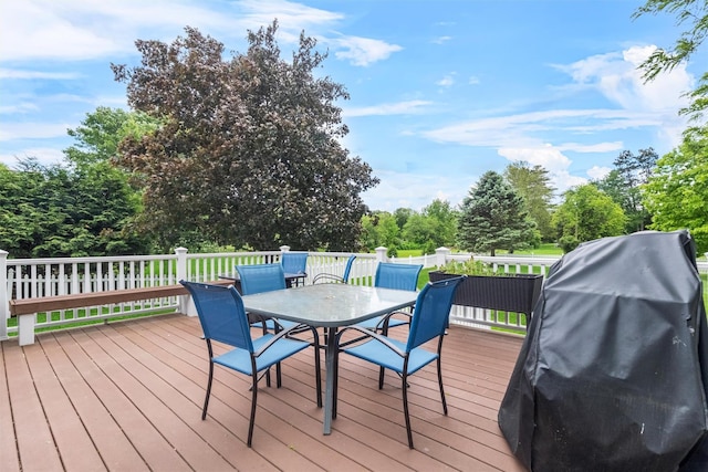 7 Brandy Ln, Hopewell Junction, NY 12590 - wooden deck featuring outdoor dining space, grilling area, and view of wooded area