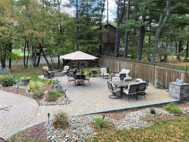 1 Parkview Dr, Middletown, NY 10940 - fenced backyard featuring a fire pit, a patio area, and outdoor dining space