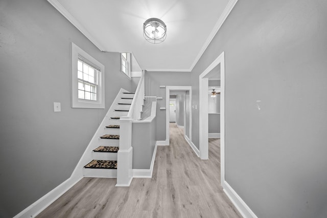199 Central Ave, Bethpage, NY 11714 - stairway featuring crown molding, wood finished floors, and baseboards