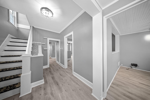199 Central Ave, Bethpage, NY 11714 - corridor featuring crown molding, light wood-type flooring, baseboards, and stairway