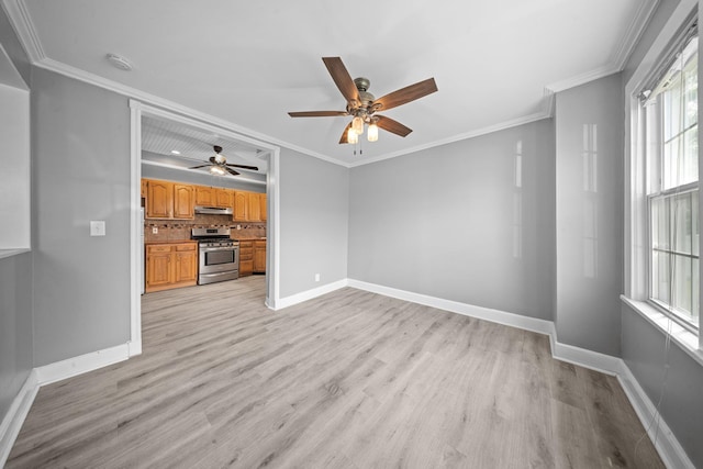 199 Central Ave, Bethpage, NY 11714 - unfurnished living room featuring light wood finished floors, baseboards, ceiling fan, and crown molding