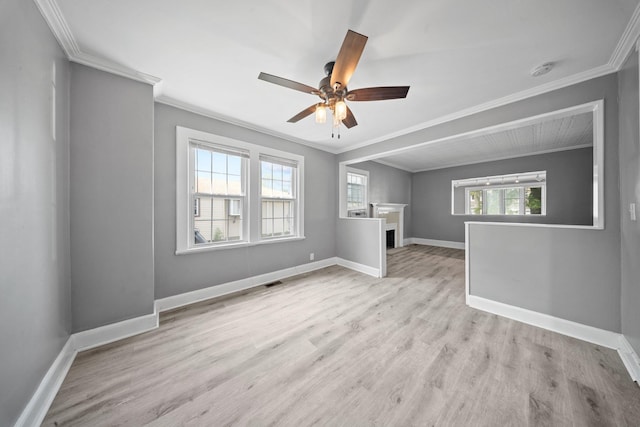 199 Central Ave, Bethpage, NY 11714 - unfurnished living room with ceiling fan, wood finished floors, baseboards, and ornamental molding