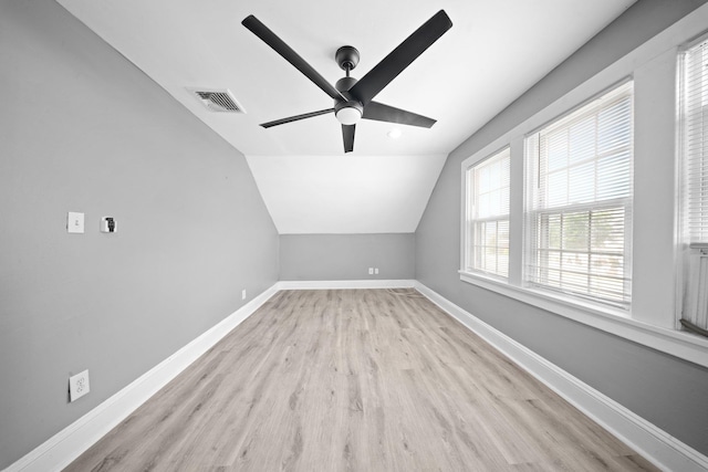 199 Central Ave, Bethpage, NY 11714 - additional living space with a ceiling fan, wood finished floors, baseboards, and lofted ceiling