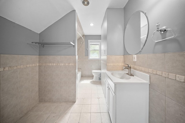 199 Central Ave, Bethpage, NY 11714 - bathroom with tile walls, tile patterned floors, toilet, vanity, and bathing tub / shower combination