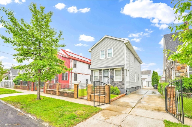 187-16 Williamson Ave, Springfield Gardens, NY 11413 - view of front of home with a gate and a residential view
