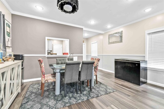 187-16 Williamson Ave, Springfield Gardens, NY 11413 - dining room featuring ornamental molding, wood finished floors, baseboards, and recessed lighting
