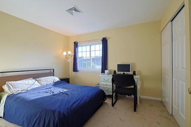 601 Covington Green Ln, Patterson, NY 12563 - bedroom featuring light colored carpet and a closet