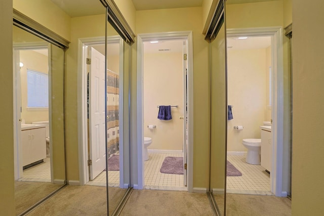 601 Covington Green Ln, Patterson, NY 12563 - hall featuring carpet flooring and tile patterned floors