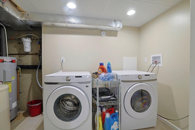 601 Covington Green Ln, Patterson, NY 12563 - laundry area featuring washer and dryer, water heater, and recessed lighting
