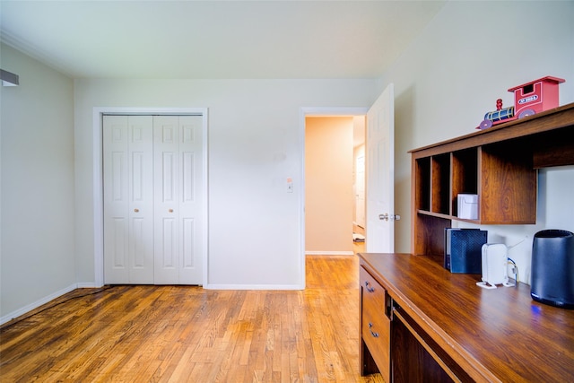 7 Ross Ln, Middletown, NY 10941 - home office with light wood-style flooring and built in study area