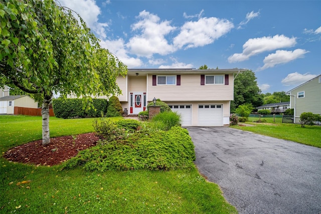 7 Ross Ln, Middletown, NY 10941 - split foyer home featuring a garage and asphalt driveway