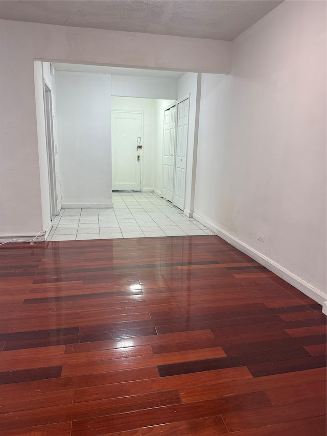 44-11 Macnish St Unit 1E, Elmhurst, NY 11373 - spare room with hardwood / wood-style floors and baseboards
