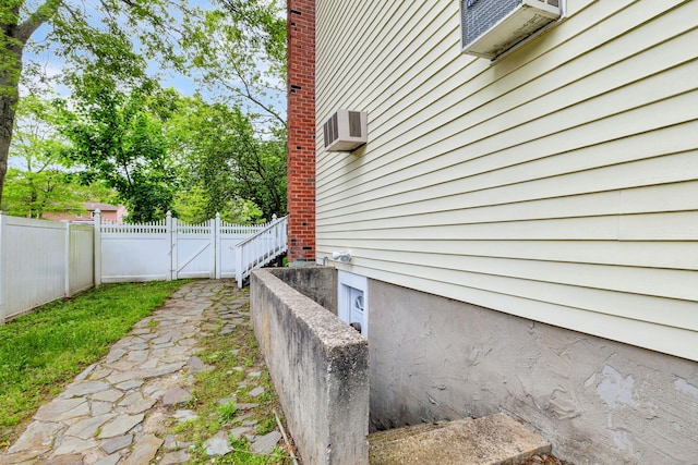 449 Terry Blvd, Holbrook, NY 11741 - view of home's exterior with a fenced backyard and a gate