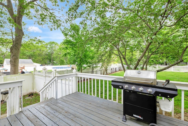 449 Terry Blvd, Holbrook, NY 11741 - wooden terrace featuring area for grilling