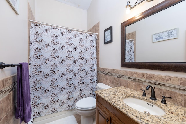 449 Terry Blvd, Holbrook, NY 11741 - bathroom featuring tile walls, toilet, vanity, a wainscoted wall, and a shower with shower curtain