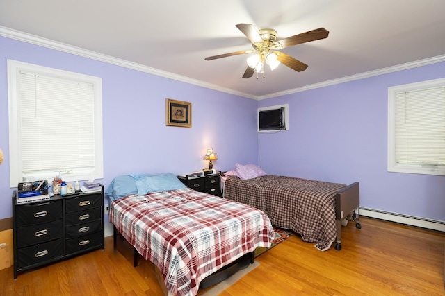449 Terry Blvd, Holbrook, NY 11741 - bedroom featuring light wood-style flooring, ornamental molding, a baseboard heating unit, and ceiling fan