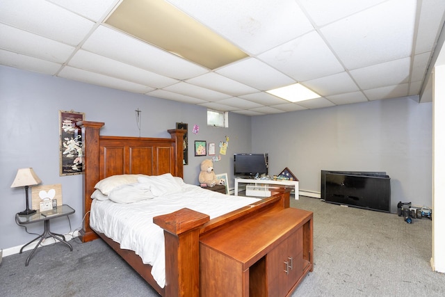 449 Terry Blvd, Holbrook, NY 11741 - bedroom featuring carpet, a paneled ceiling, baseboard heating, and baseboards