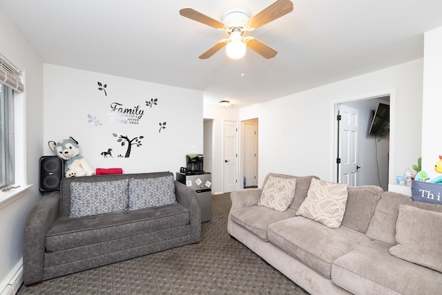 449 Terry Blvd, Holbrook, NY 11741 - living room with a baseboard radiator, a ceiling fan, and carpet flooring