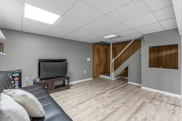 5 Michelle Ln, Selden, NY 11784 - living room featuring wood finished floors, stairway, and a drop ceiling