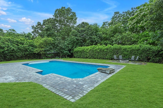 5 Michelle Ln, Selden, NY 11784 - view of pool featuring a patio, an outdoor fire pit, and a fenced backyard