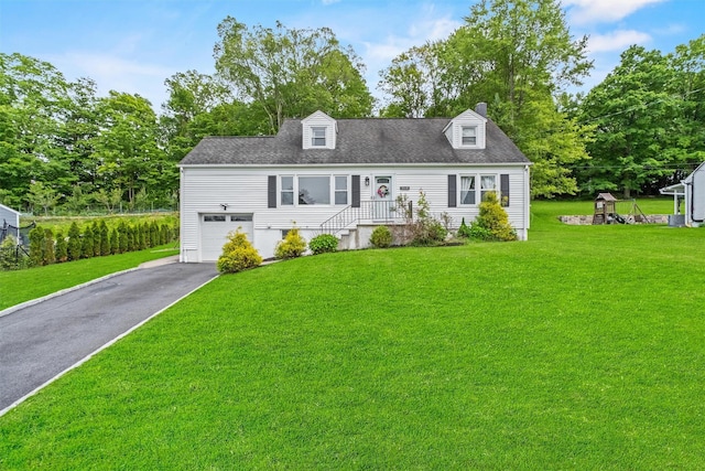 3518 Overlook Ave, Yorktown Heights, NY 10598 - cape cod house with driveway, a garage, a front lawn, and view of wooded area