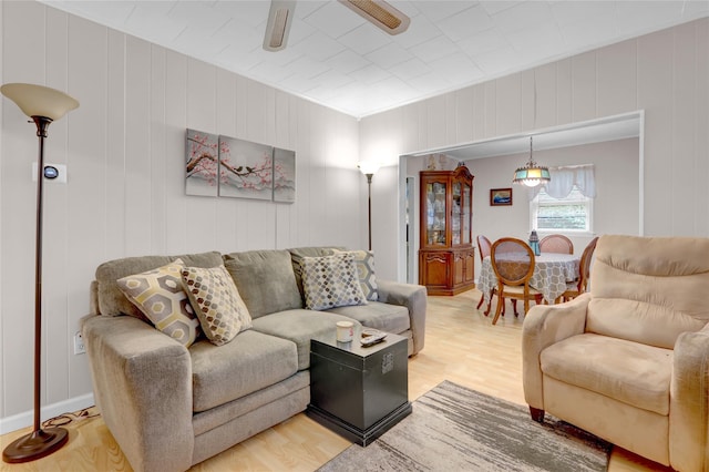 5 The Promenade, Glen Head, NY 11545 - living room featuring light wood-style flooring and a ceiling fan