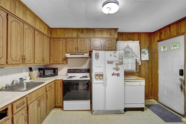 5 The Promenade, Glen Head, NY 11545 - kitchen featuring white appliances, under cabinet range hood, light flooring, a sink, and light countertops