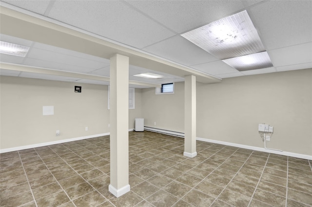 5 The Promenade, Glen Head, NY 11545 - basement featuring a drop ceiling, tile patterned flooring, and baseboards