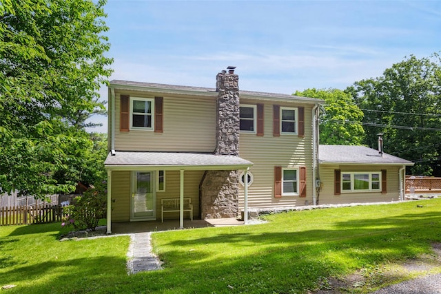 420 Fourth Rd, Wappingers Falls, NY 12590 - back of house featuring a chimney, stone siding, and roof with shingles