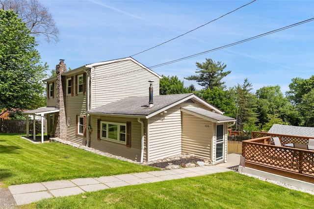 420 Fourth Rd, Wappingers Falls, NY 12590 - back of house with a chimney and a shingled roof