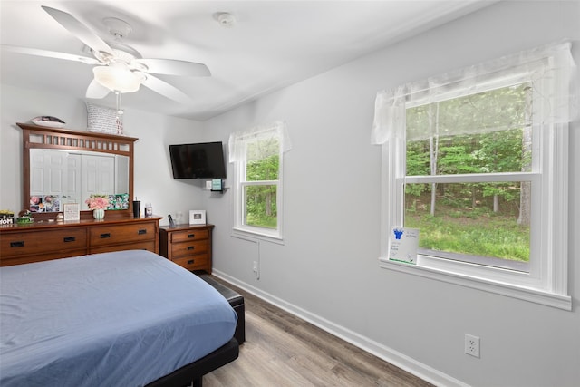 420 Fourth Rd, Wappingers Falls, NY 12590 - bedroom with wood finished floors, baseboards, and ceiling fan