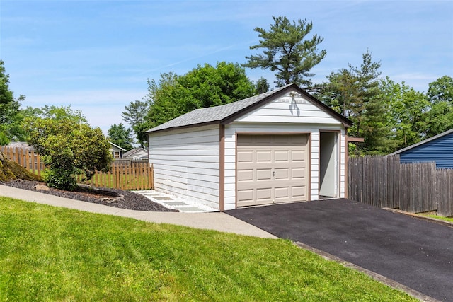 420 Fourth Rd, Wappingers Falls, NY 12590 - detached garage featuring asphalt driveway