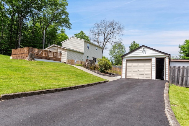 420 Fourth Rd, Wappingers Falls, NY 12590 - view of side of home with an outdoor structure, a garage, asphalt driveway, and a deck