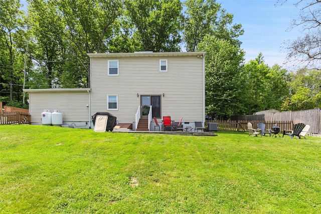 420 Fourth Rd, Wappingers Falls, NY 12590 - rear view of property with an outdoor fire pit and central air condition unit