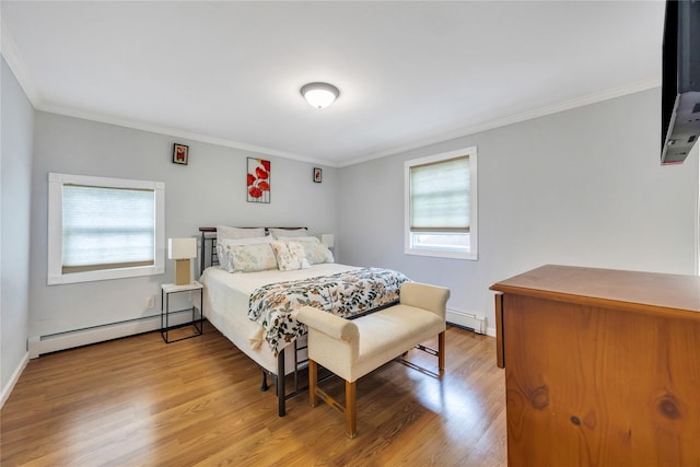243 Sunflower Ln, Islandia, NY 11749 - bedroom featuring a baseboard heating unit, ornamental molding, wood finished floors, and baseboards