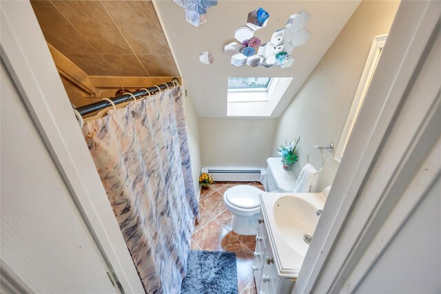 243 Sunflower Ln, Islandia, NY 11749 - full bathroom featuring a baseboard heating unit, a skylight, tile patterned floors, vanity, and toilet