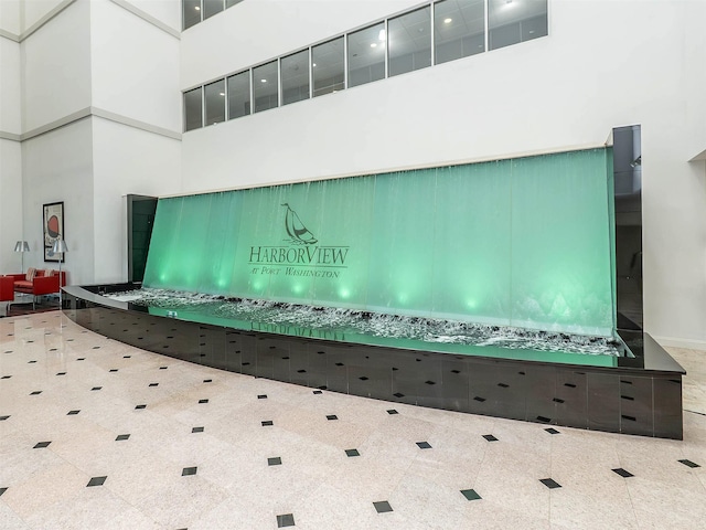 100 Harbor View Dr Unit 515, Port Washington, NY 11050 - reception with a high ceiling