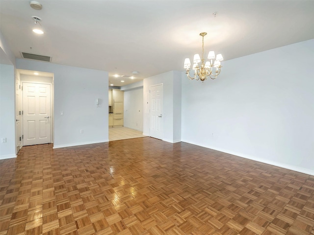 100 Harbor View Dr Unit 515, Port Washington, NY 11050 - unfurnished room featuring baseboards, a chandelier, and recessed lighting
