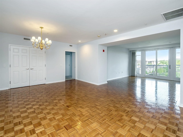 100 Harbor View Dr Unit 515, Port Washington, NY 11050 - spare room with baseboards, a chandelier, and recessed lighting