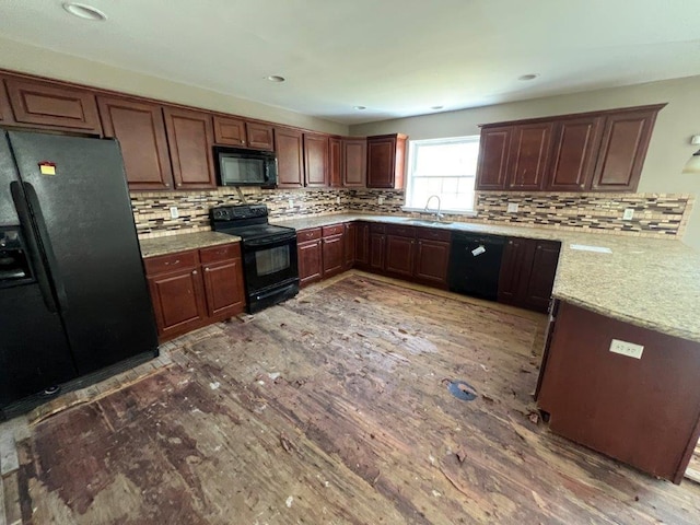 11 Willow Ln, Glen Spey, NY 12737 - kitchen featuring black appliances, a sink, decorative backsplash, light wood-style floors, and recessed lighting